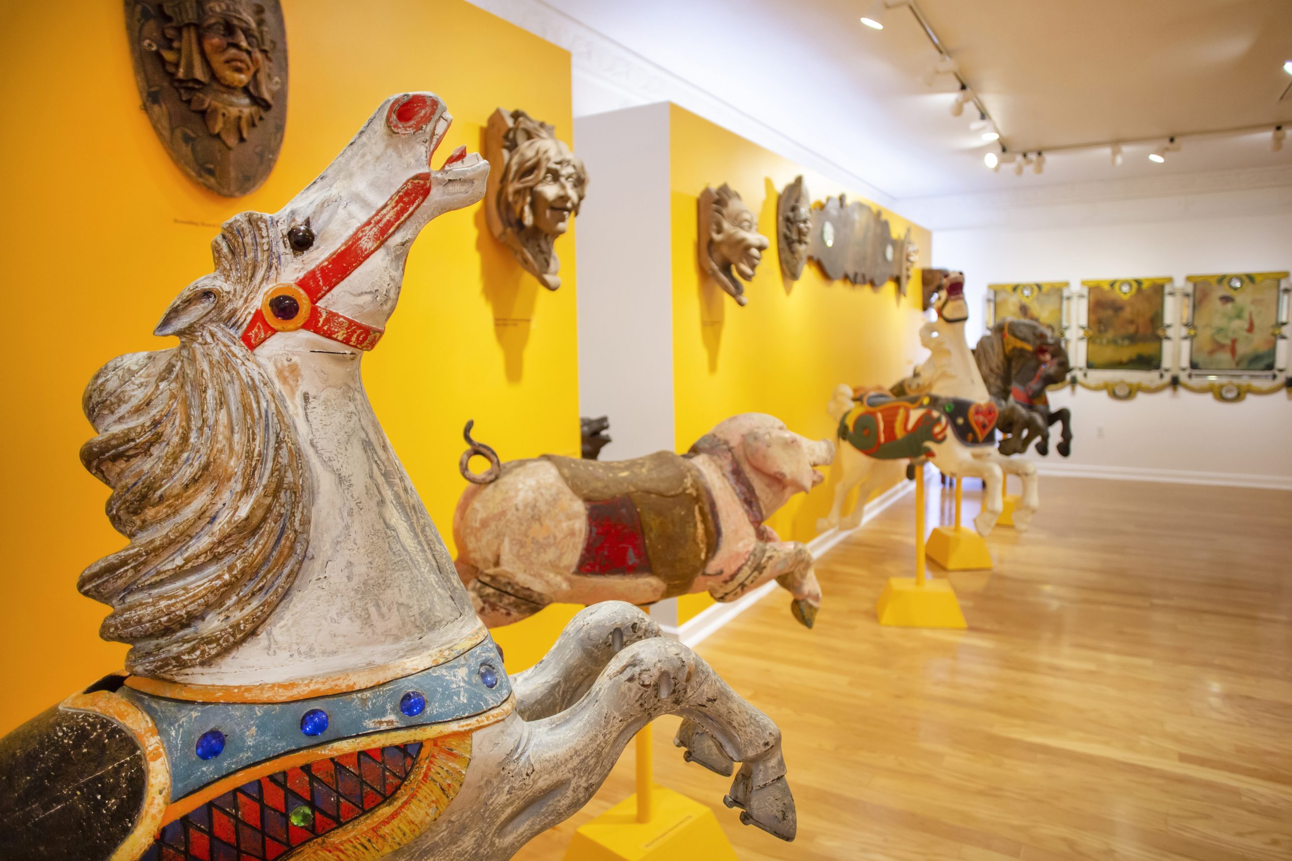 Wooden carvings and carousel animals in Americana and Folk Art Collection